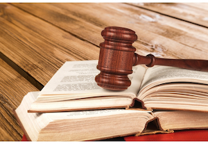 Wooden gavel and book