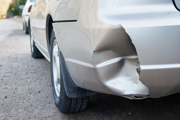 A dent in a bumper after a hit and run