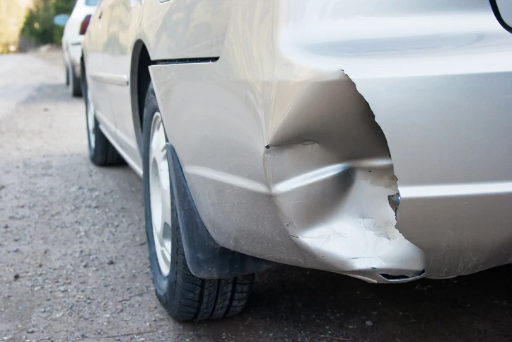 A dent in a bumper after a hit and run