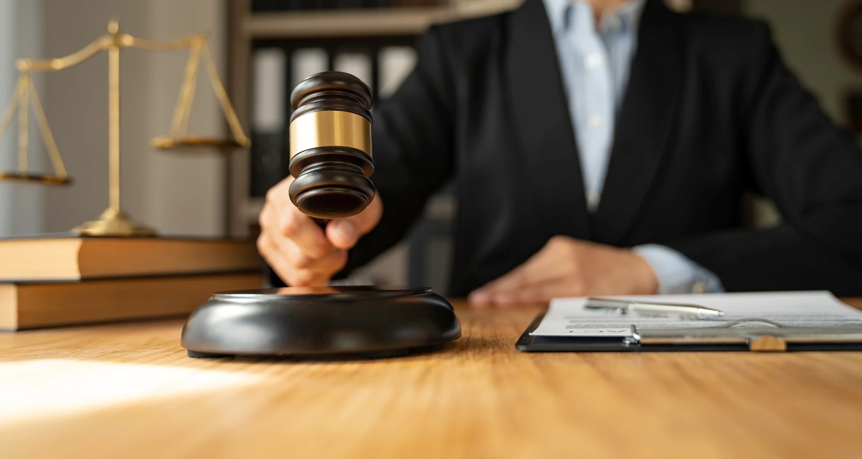 Orange County Criminal Defense Attorney and a Judge Hitting their Gavel